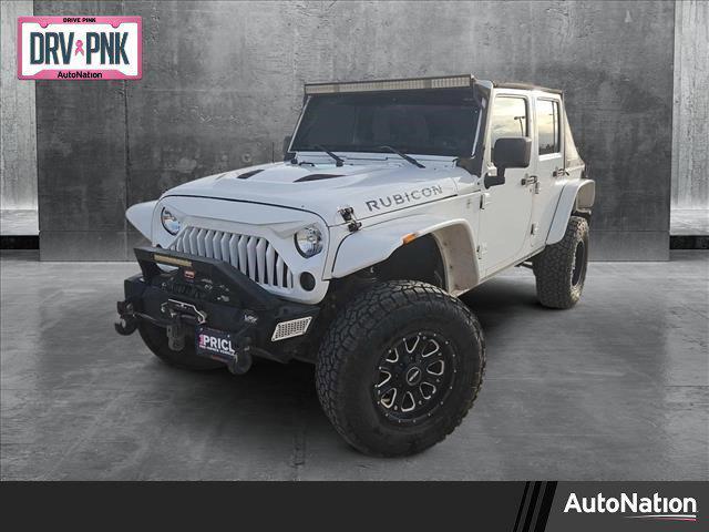 used 2012 Jeep Wrangler Unlimited car, priced at $19,499