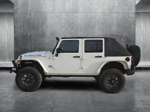 used 2012 Jeep Wrangler Unlimited car, priced at $19,499