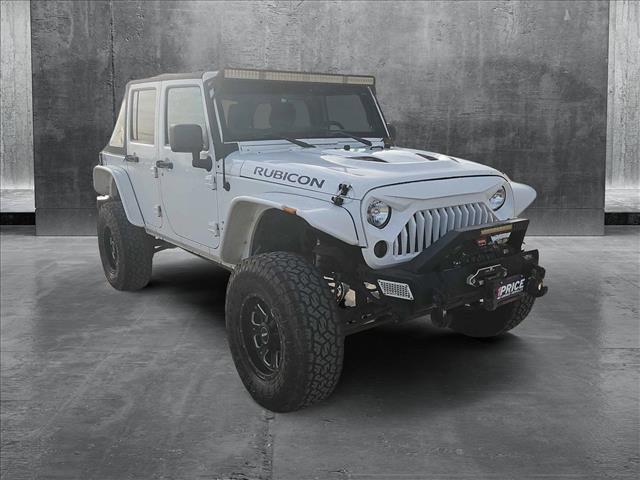 used 2012 Jeep Wrangler Unlimited car, priced at $19,499