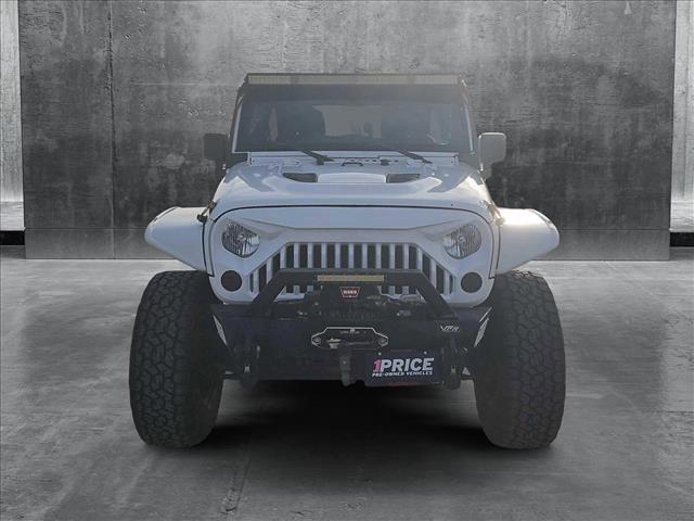 used 2012 Jeep Wrangler Unlimited car, priced at $19,499