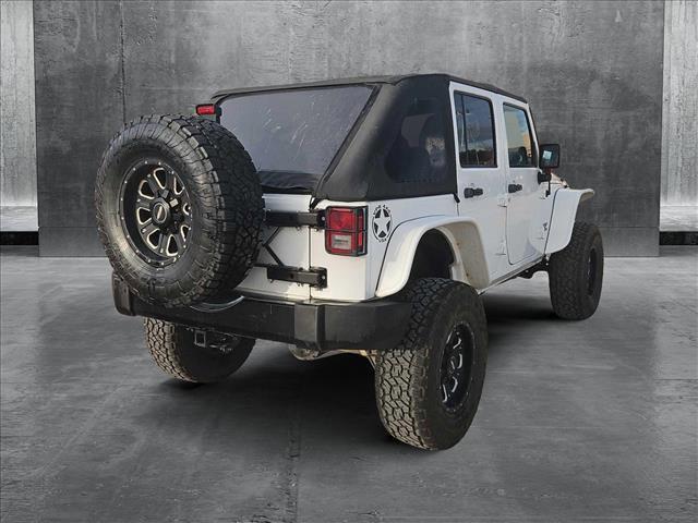 used 2012 Jeep Wrangler Unlimited car, priced at $19,499