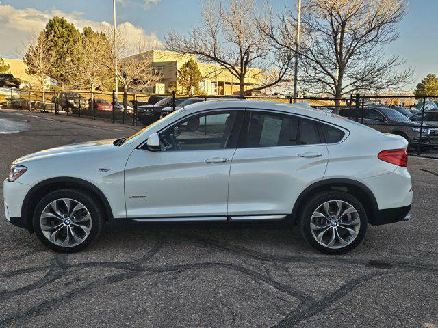 used 2018 BMW X4 car, priced at $28,574