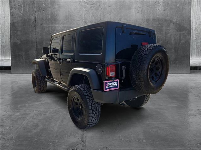 used 2015 Jeep Wrangler Unlimited car, priced at $18,569