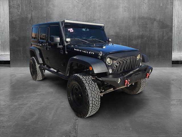 used 2015 Jeep Wrangler Unlimited car, priced at $18,569