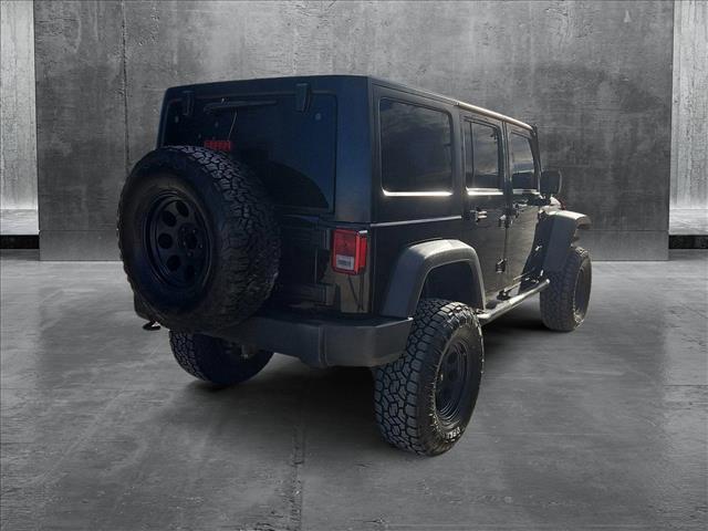 used 2015 Jeep Wrangler Unlimited car, priced at $18,569