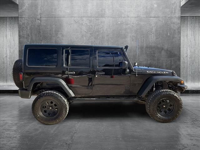 used 2015 Jeep Wrangler Unlimited car, priced at $18,569