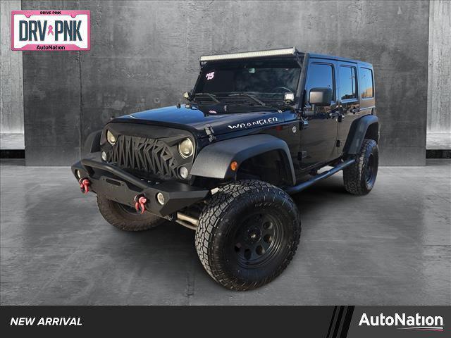 used 2015 Jeep Wrangler Unlimited car, priced at $18,569