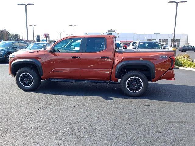 used 2025 Toyota Tacoma car, priced at $45,291