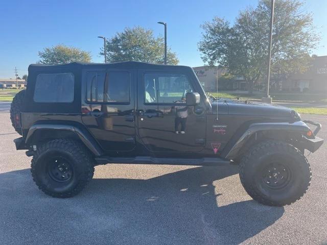 used 2016 Jeep Wrangler Unlimited car, priced at $16,991