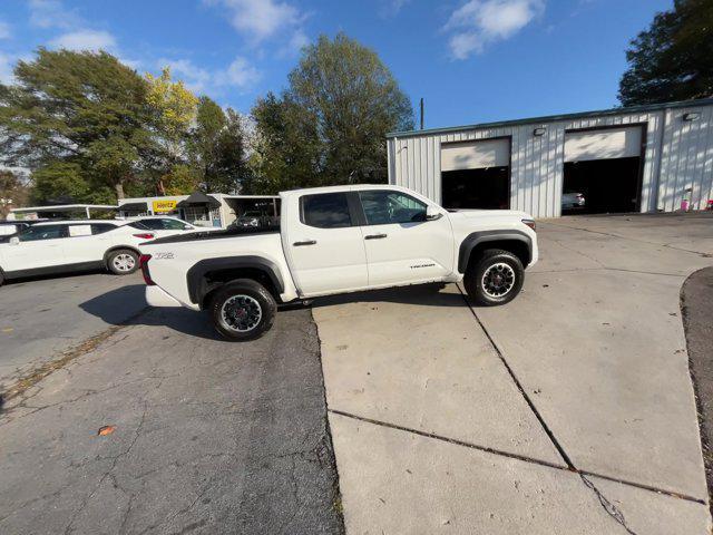 used 2024 Toyota Tacoma car, priced at $39,055