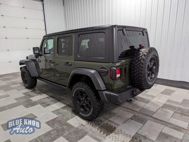 used 2023 Jeep Wrangler 4xe car, priced at $33,998