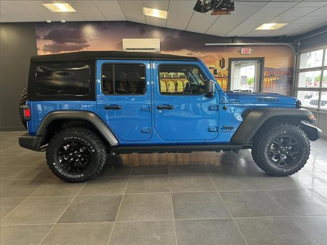 used 2023 Jeep Wrangler car, priced at $37,428