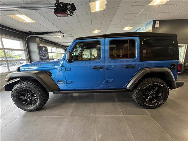 used 2023 Jeep Wrangler car, priced at $37,428