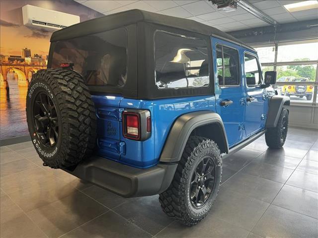 used 2023 Jeep Wrangler car, priced at $37,428