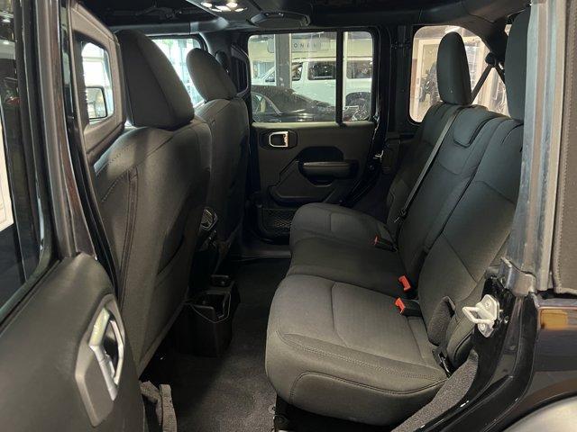 used 2021 Jeep Wrangler Unlimited car, priced at $33,046