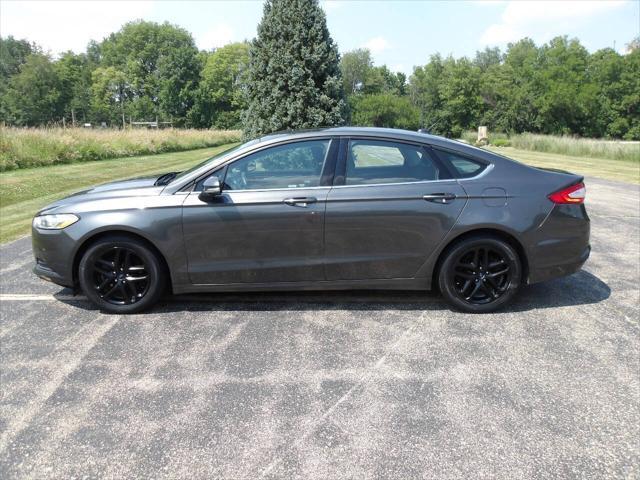 used 2016 Ford Fusion car, priced at $4,995