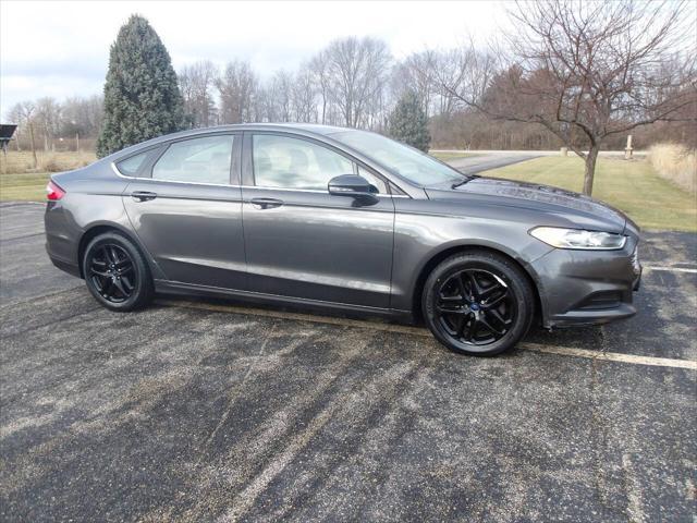 used 2016 Ford Fusion car, priced at $4,995