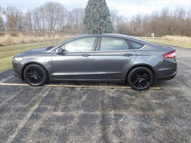 used 2016 Ford Fusion car, priced at $4,995