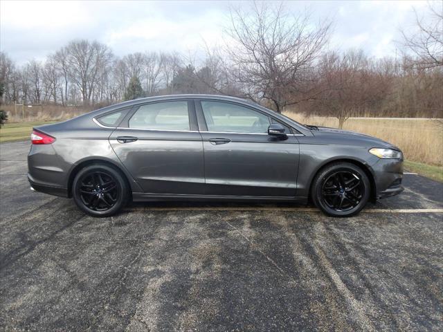 used 2016 Ford Fusion car, priced at $4,995