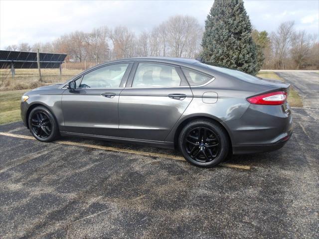 used 2016 Ford Fusion car, priced at $4,995