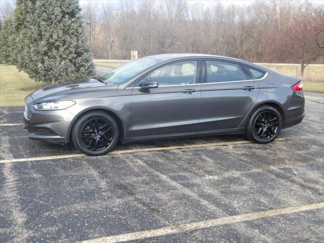 used 2016 Ford Fusion car, priced at $4,995