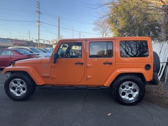 used 2013 Jeep Wrangler Unlimited car, priced at $13,000