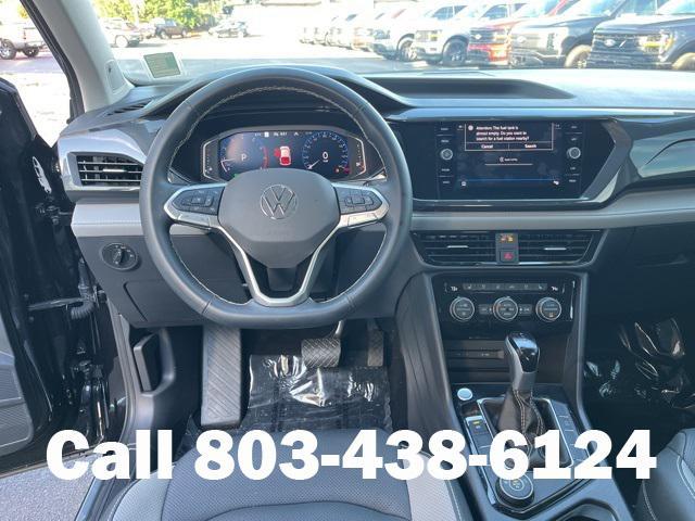 used 2024 Volkswagen Taos car, priced at $25,695