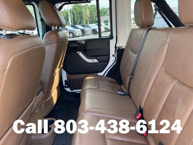 used 2014 Jeep Wrangler Unlimited car, priced at $17,801