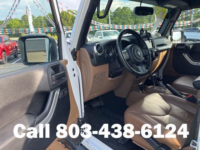 used 2014 Jeep Wrangler Unlimited car, priced at $17,801