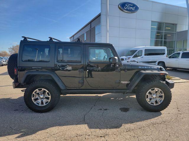 used 2014 Jeep Wrangler Unlimited car, priced at $16,969