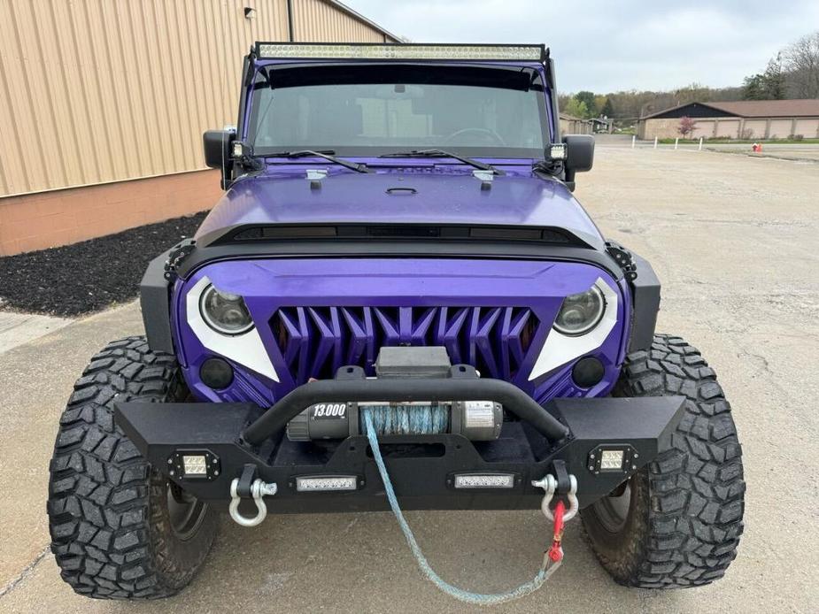 used 2009 Jeep Wrangler Unlimited car, priced at $13,995