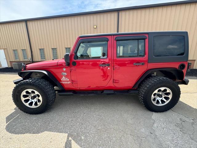 used 2010 Jeep Wrangler Unlimited car, priced at $11,995