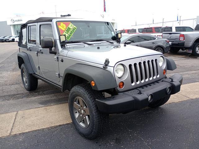 used 2013 Jeep Wrangler Unlimited car, priced at $16,990