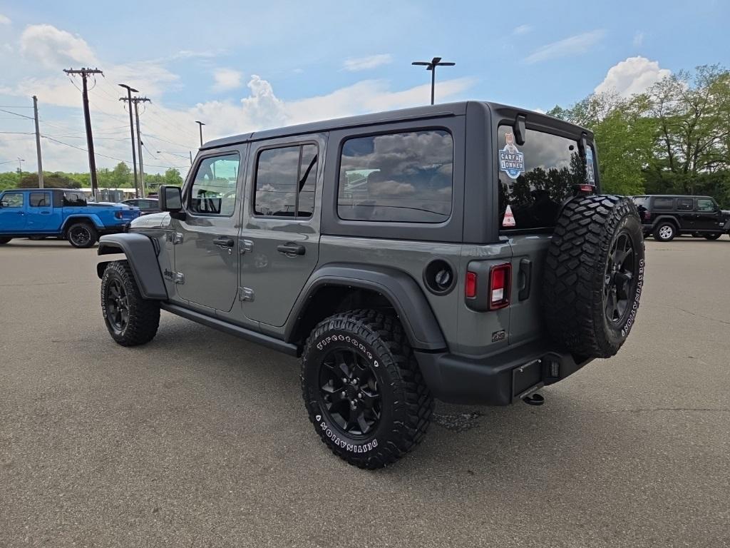 used 2021 Jeep Wrangler Unlimited car, priced at $32,788