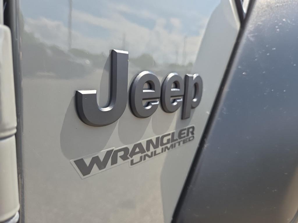 used 2021 Jeep Wrangler Unlimited car, priced at $32,788