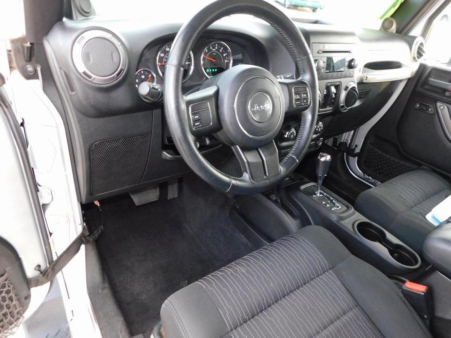 used 2012 Jeep Wrangler Unlimited car, priced at $16,990