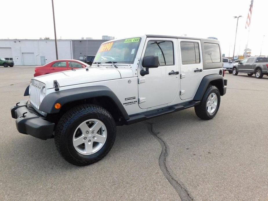 used 2012 Jeep Wrangler Unlimited car, priced at $16,990