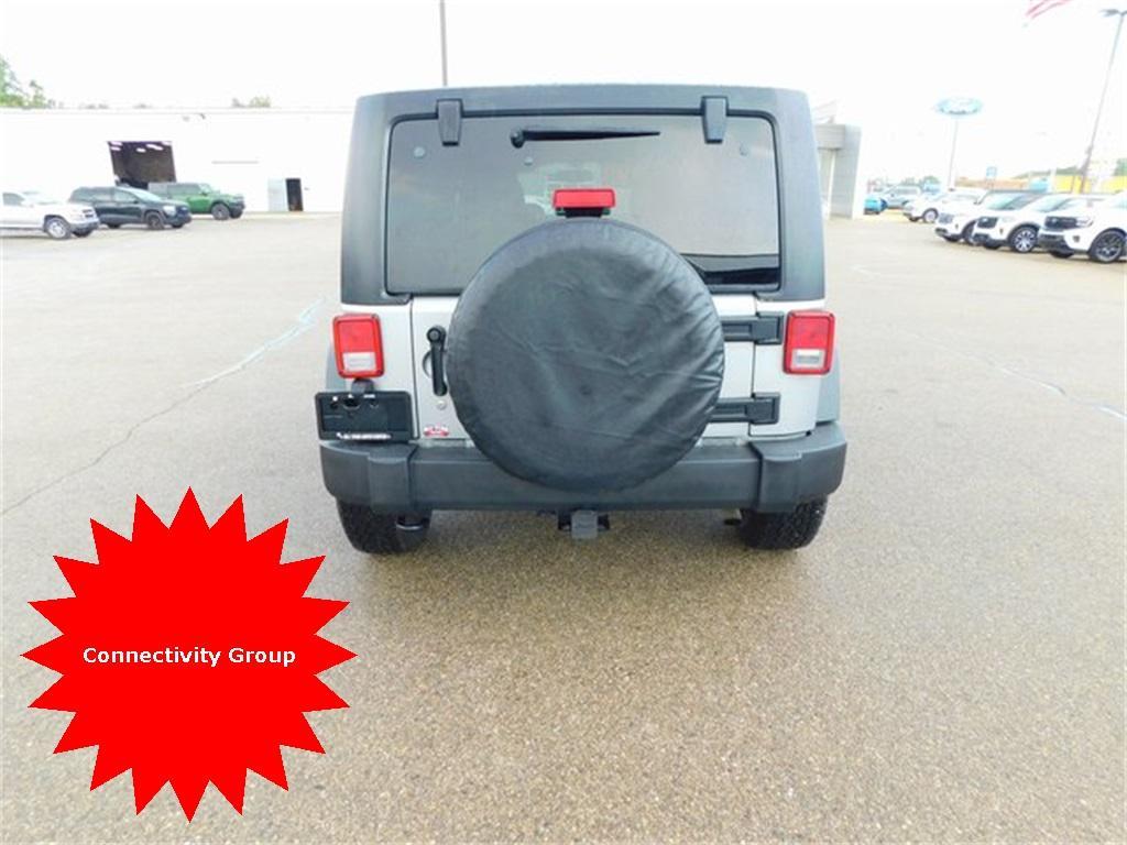 used 2015 Jeep Wrangler Unlimited car, priced at $14,590
