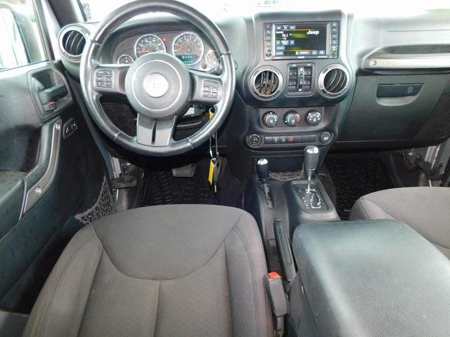 used 2015 Jeep Wrangler Unlimited car, priced at $14,590