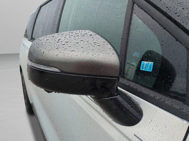 new 2025 Kia Carnival Hybrid car, priced at $53,174
