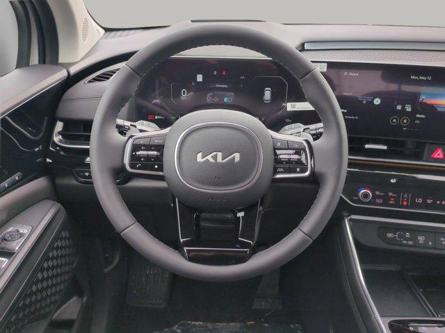 new 2025 Kia Carnival Hybrid car, priced at $53,174