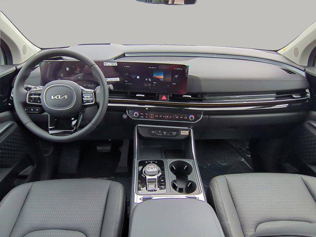 new 2025 Kia Carnival Hybrid car, priced at $53,174