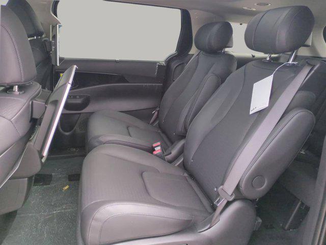 new 2025 Kia Carnival Hybrid car, priced at $53,174