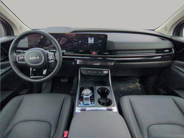 new 2025 Kia Carnival Hybrid car, priced at $53,174