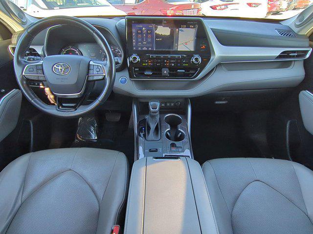 used 2021 Toyota Highlander Hybrid car, priced at $35,695