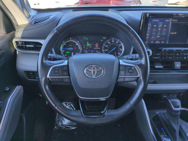 used 2021 Toyota Highlander Hybrid car, priced at $35,695