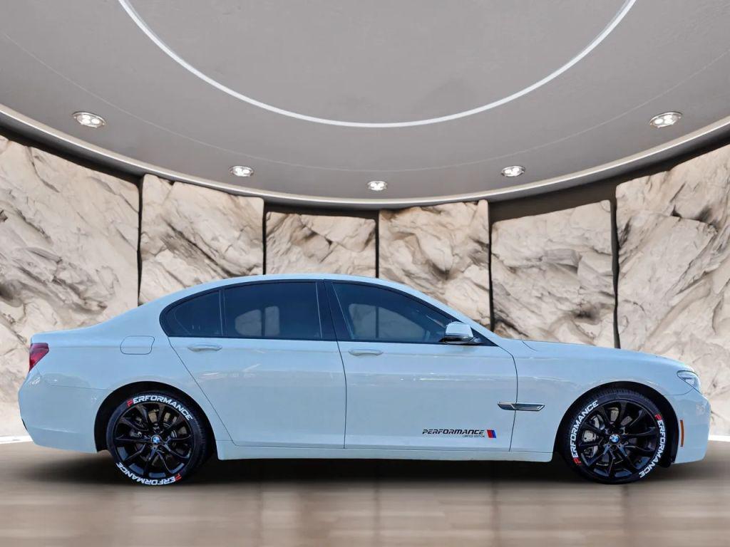 used 2015 BMW 750 car, priced at $16,990
