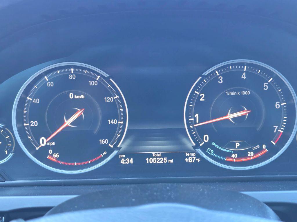 used 2015 BMW 750 car, priced at $16,990