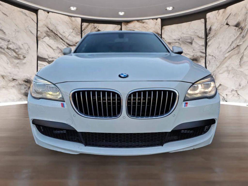 used 2015 BMW 750 car, priced at $16,990