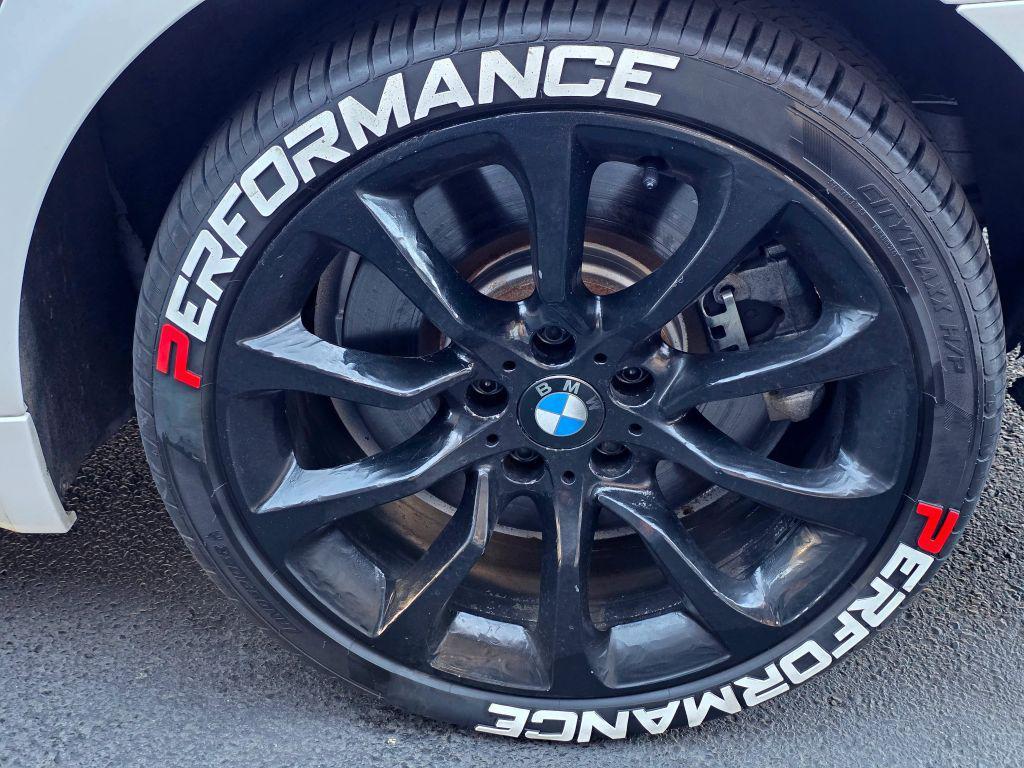 used 2015 BMW 750 car, priced at $16,990